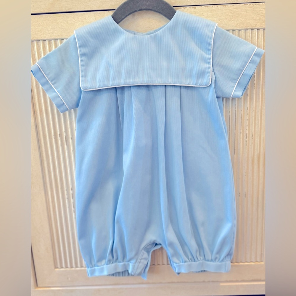 Monday’s Child light blue one piece, size 12M
